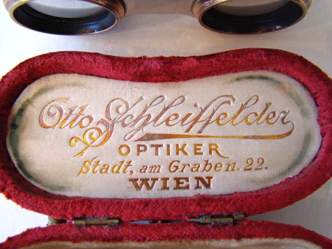 A fine pair of late 19th century Austrian Opera Glasses with their original red velvet purse/case — image 3